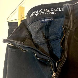 Black American Eagle Super Stretch distressed jegging, size 8 long.